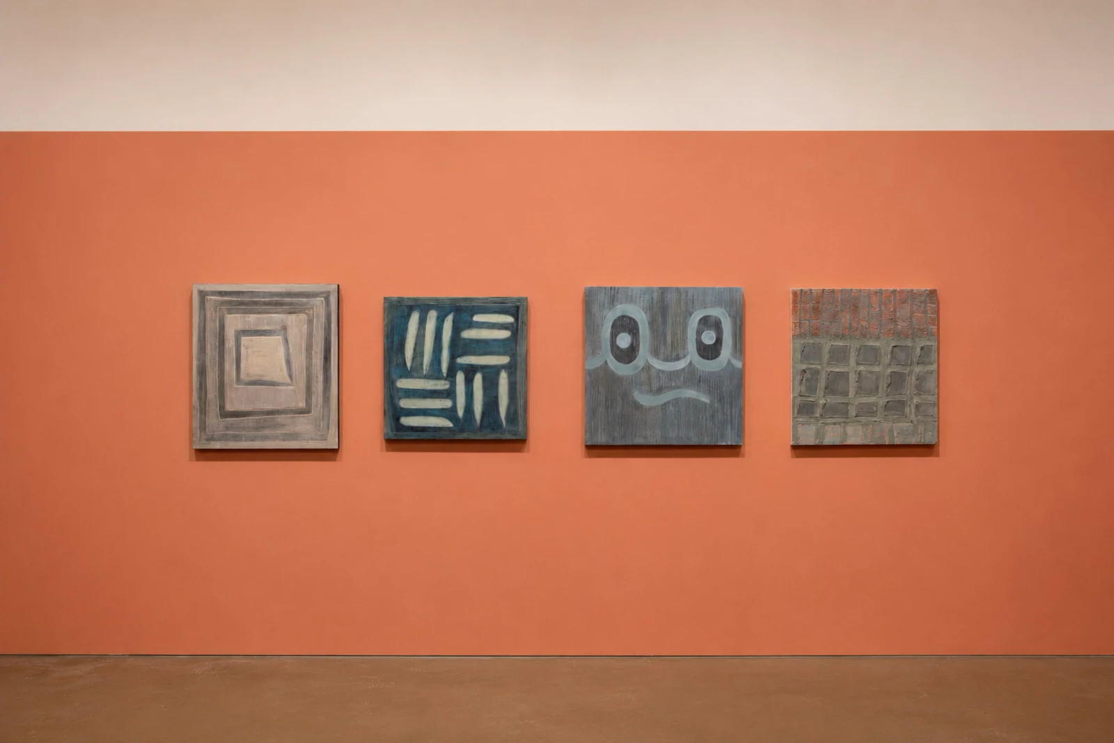 Four paintings by Michelle Perez Kenderish installed on an orange gallery wall